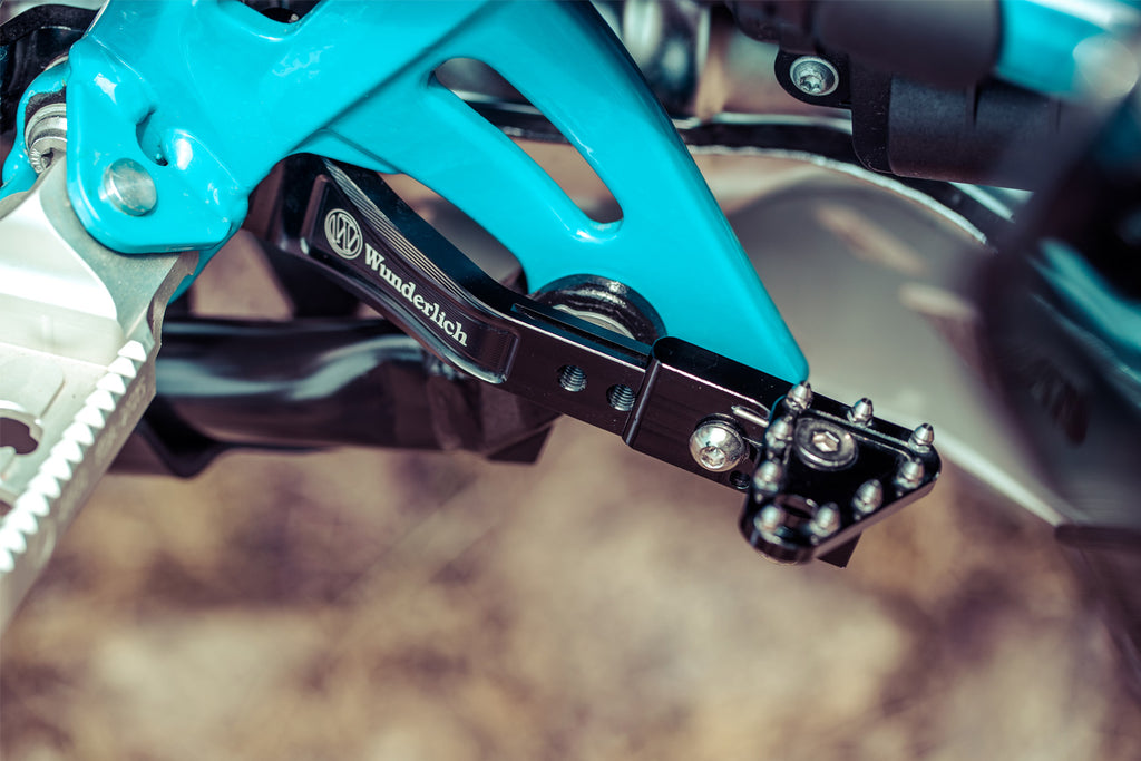 Adjustable foot brake lever